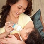 mother child feeding eye gaze